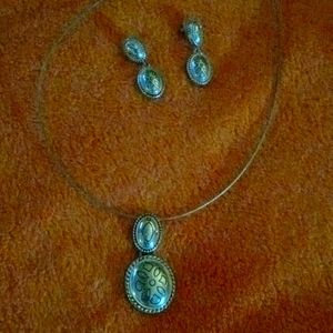 Silver necklace, earrings and bracelet